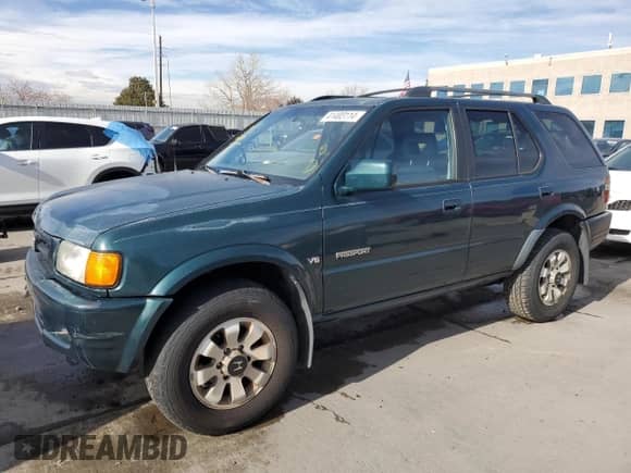 1998 Honda Passport LX with VIN 4S6CM58W2W4403473, listed as a Copart auction lot 66621474 with 154,892 mi miles and Clean title. Bid and sale history available at DreamBid. Image 1.