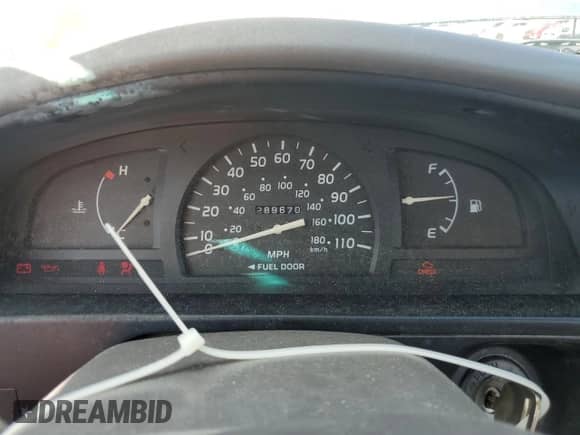 2002 Toyota Tacoma с VIN 5TENL42NX2Z025973, выставлен на аукционе Copart как лот 84580115 с пробегом 289 670 миль миль и Списание • Salvage title. История ставок и продаж доступна на DreamBid. Изображение 9.