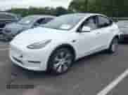 2022 Tesla Model Y Long Range z VIN 7SAYGDEE6NF317707, wystawiony jako IAAI lot #43186532 z przebiegiem 45 306 mil mil oraz . Historia ofert i sprzedaży dostępna na DreamBid. Obrazek 21.