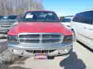 1999 Dodge Dakota SLT z VIN 1B7GG22Y3XS289253, wystawiony jako IAAI lot #41283728 z przebiegiem 154 038 mil mil oraz . Historia ofert i sprzedaży dostępna na DreamBid. Obrazek 6.