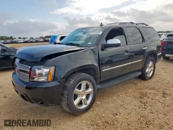 2011 Chevrolet Tahoe LTZ z VIN 1GNSCCE01BR117313, wystawiony jako Copart lot #63123425 z przebiegiem 175 182 mil mil oraz Szkoda całkowita • Salvage title. Historia ofert i sprzedaży dostępna na DreamBid. Obrazek 1.