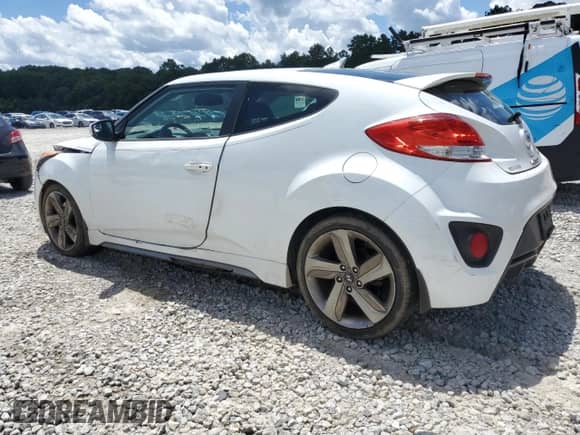 2013 Hyundai Veloster Turbo с VIN KMHTC6AE8DU172644, выставлен на аукционе Copart как лот 64363485 с пробегом 80 245 миль миль и Списание • Salvage title. История ставок и продаж доступна на DreamBid. Изображение 2.
