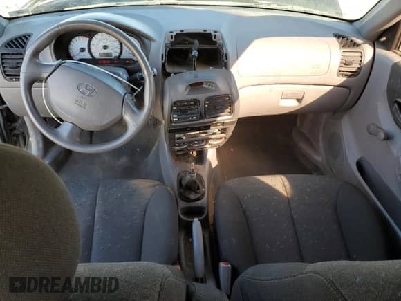 2005 Hyundai Accent GLS с VIN KMHCG35C05U352567, выставлен на аукционе Copart как лот 49114555 с пробегом 77 847 миль миль и Списание • Salvage title. История ставок и продаж доступна на DreamBid. Изображение 8.