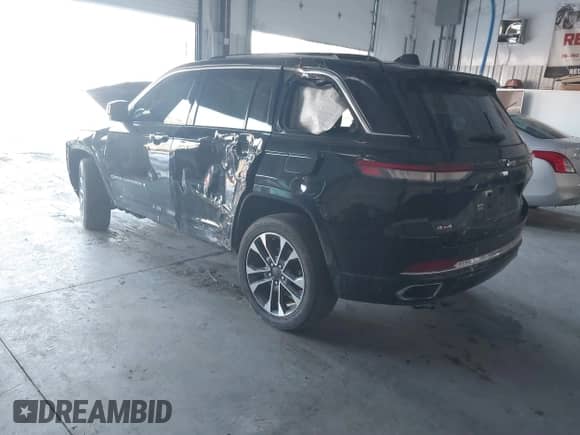 2023 Jeep Grand Cherokee Overland z VIN 1C4RJHDG5PC507978, wystawiony jako IAAI lot #41394199 z przebiegiem 57 323 mil mil oraz . Historia ofert i sprzedaży dostępna na DreamBid. Obrazek 3.