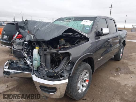 2019 Ram 1500 Laramie with VIN 1C6RREJT2KN635625, listed as a IAAI auction lot 42203102 with 109,516 mi miles and . Bid and sale history available at DreamBid. Image 2.