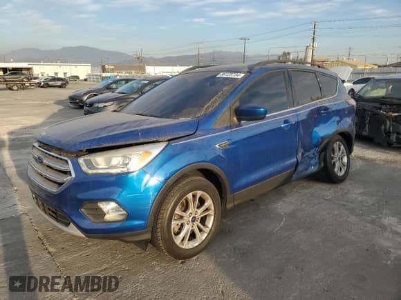 2017 Ford Escape SE с VIN 1FMCU9G9XHUA11145, выставлен на аукционе Copart как лот 86125734 с пробегом 106 846 миль миль и Чистый • Clean title. История ставок и продаж доступна на DreamBid. Изображение 1.