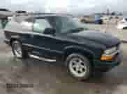 2002 Chevrolet Blazer LS с VIN 1GNCS18W52K111907, выставлен на аукционе Copart как лот 78907894 с пробегом 88 184 миль миль и Списание • Salvage title. История ставок и продаж доступна на DreamBid. Изображение 4.