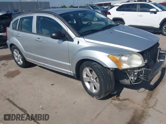 2010 Dodge Caliber SXT with VIN 1B3CB4HA7AD660883, listed as a IAAI auction lot 42270568 with 146,723 mi miles and . Bid and sale history available at DreamBid. Image 1.