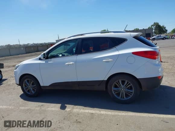 2015 Hyundai Tucson Limited z VIN KM8JUCAG4FU112741, wystawiony jako IAAI lot #42175560 z przebiegiem 159 589 mil mil oraz . Historia ofert i sprzedaży dostępna na DreamBid. Obrazek 14.