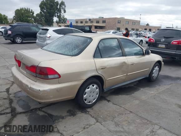 2001 Honda Accord LX with VIN 1HGCG56441A140971, listed as a IAAI auction lot 43416644 with 159,541 mi miles and . Bid and sale history available at DreamBid. Image 4.