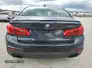 2018 BMW 5 Series M550i xDrive with VIN WBAJB9C53JB286164, listed as a Copart auction lot 71052315 with 91,157 mi miles and Clean title. Bid and sale history available at DreamBid. Image 6.