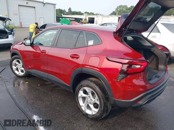 2024 Chevrolet Trax LS with VIN KL77LFE25RC100753, listed as a IAAI auction lot 42915541 with 29,428 mi miles and . Bid and sale history available at DreamBid. Image 3.