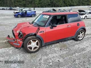 2002 MINI Hardtop with VIN WMWRC33462TE12083, listed as a Copart auction lot 56871845 with 343,129 mi miles and Salvage title. Bid and sale history available at DreamBid. Image 1.