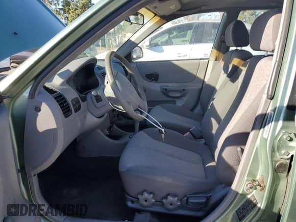 2003 Hyundai Accent GL с VIN KMHCG45C63U430403, выставлен на аукционе Copart как лот 86430724 с пробегом 74 200 миль миль и Списание • Salvage title. История ставок и продаж доступна на DreamBid. Изображение 7.