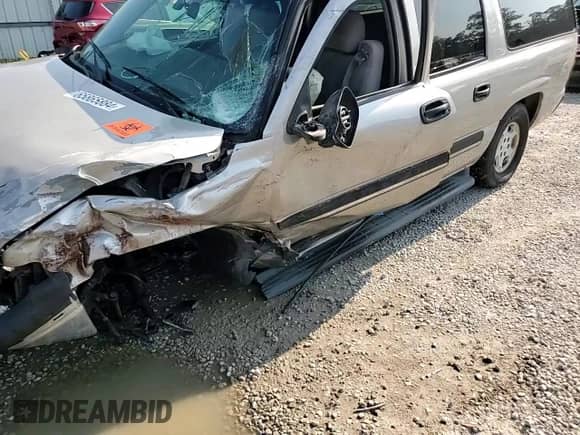 2005 Chevrolet Suburban LS with VIN 3GNEC16Z95G159375, listed as a Copart auction lot 65865884 with 290,671 mi miles and Salvage title. Bid and sale history available at DreamBid. Image 12.