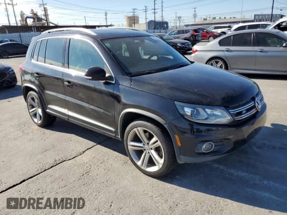 2015 Volkswagen Tiguan SEL z VIN WVGBV7AX1FW504346, wystawiony jako Copart lot #85332635 z przebiegiem 89 744 mil mil oraz Szkoda całkowita • Salvage title. Historia ofert i sprzedaży dostępna na DreamBid. Obrazek 4.