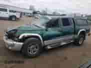 2003 Dodge Dakota SLT z VIN 1D7HG48N73S239498, wystawiony jako Copart lot #57225245 z przebiegiem Nie podano mil oraz Szkoda całkowita • Salvage title. Historia ofert i sprzedaży dostępna na DreamBid. Obrazek 1.