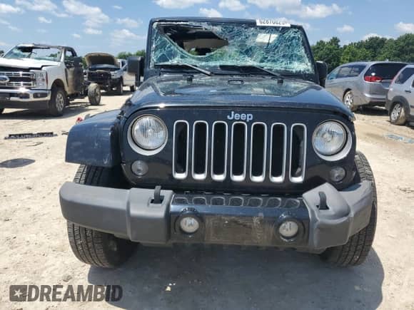 2016 Jeep Wrangler Sahara with VIN 1C4AJWBG2GL128652, listed as a Copart auction lot 62870825 with 80,314 mi miles and Salvage title. Bid and sale history available at DreamBid. Image 5.