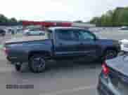 2023 Toyota Tacoma SR z VIN 3TMCZ5AN3PM613358, wystawiony jako IAAI lot #43211852 z przebiegiem 25 287 mil mil oraz . Historia ofert i sprzedaży dostępna na DreamBid. Obrazek 13.