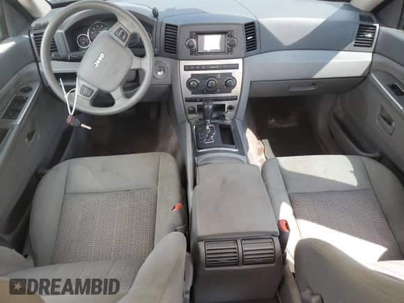 2007 Jeep Grand Cherokee Laredo с VIN 1J8GR48K47C628579, выставлен на аукционе Copart как лот 81280495 с пробегом 210 296 миль миль и Списание • Salvage title. История ставок и продаж доступна на DreamBid. Изображение 8.