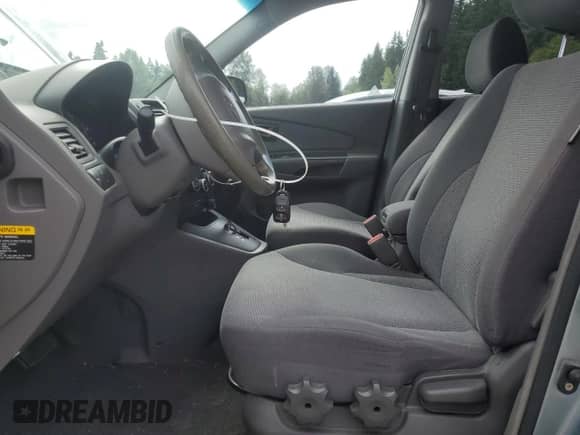 2006 Hyundai Tucson GL z VIN KM8JM12B86U436413, wystawiony jako Copart lot #69462885 z przebiegiem 156 051 mil mil oraz Szkoda całkowita • Salvage title. Historia ofert i sprzedaży dostępna na DreamBid. Obrazek 7.