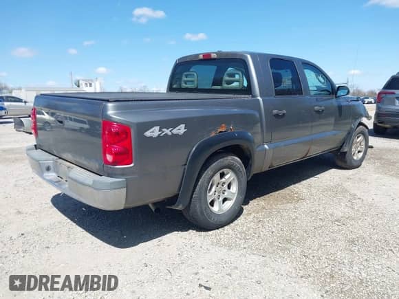 2006 Dodge Dakota SLT with VIN 1D7HW48KX6S547519, listed as a IAAI auction lot 41971182 with 205,859 mi miles and . Bid and sale history available at DreamBid. Image 4.