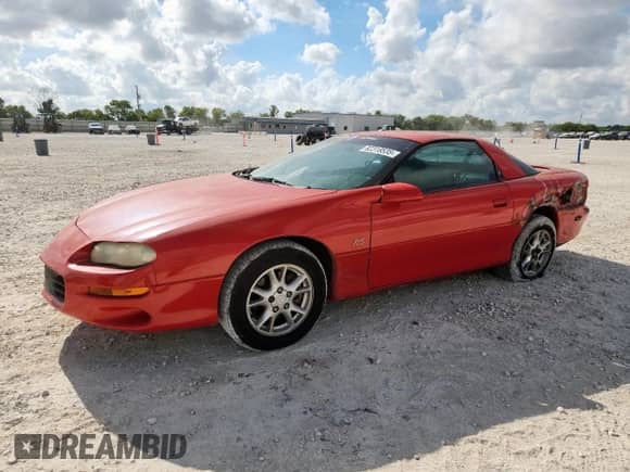 2002 Chevrolet Camaro с VIN 2G1FP22K422105053, выставлен на аукционе Copart как лот 82318535 с пробегом 106 900 миль миль и Списание • Salvage title. История ставок и продаж доступна на DreamBid. Изображение 1.