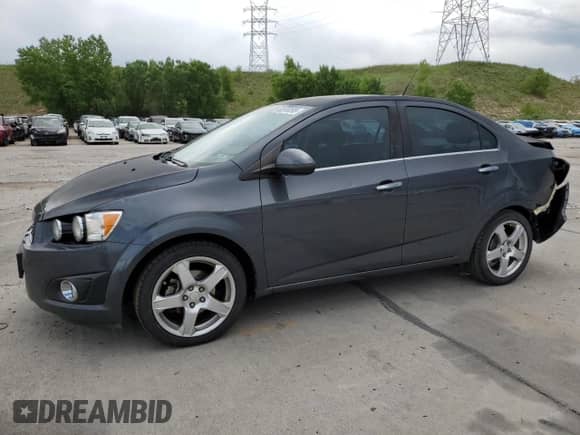 2013 Chevrolet Sonic LTZ с VIN 1G1JE5SH0D4102525, выставлен на аукционе Copart как лот 60976595 с пробегом 138 420 миль миль и Списание • Salvage title. История ставок и продаж доступна на DreamBid. Изображение 1.