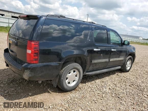 2014 Chevrolet Suburban LT с VIN 1GNSKJE77ER205016, выставлен на аукционе Copart как лот 61070575 с пробегом 154 571 миль миль и Списание • Salvage title. История ставок и продаж доступна на DreamBid. Изображение 3.