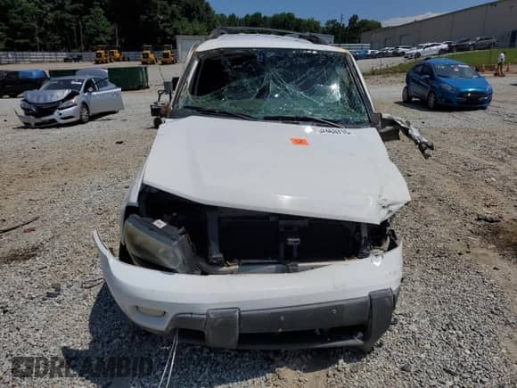 2002 Chevrolet TrailBlazer EXT LT z VIN 1GNET16S526101179, wystawiony jako Copart lot #62463715 z przebiegiem Nie podano mil oraz Szkoda całkowita • Salvage title. Historia ofert i sprzedaży dostępna na DreamBid. Obrazek 5.