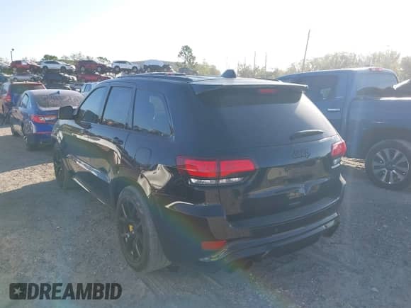 2018 Jeep Grand Cherokee Trackhawk z VIN 1C4RJFN95JC283798, wystawiony jako IAAI lot #40739384 z przebiegiem 54 065 mil mil oraz . Historia ofert i sprzedaży dostępna na DreamBid. Obrazek 3.