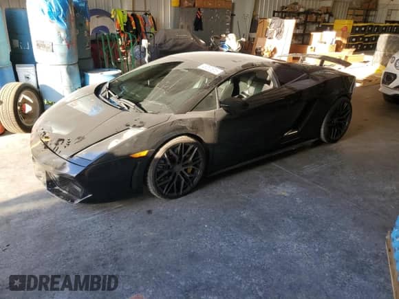 2005 Lamborghini Gallardo с VIN ZHWGU11S65LA02165, выставлен на аукционе Copart как лот 48230615 с пробегом 42 121 миль миль и Списание • Salvage title. История ставок и продаж доступна на DreamBid. Изображение 1.