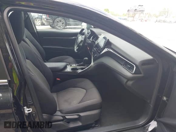 2022 Toyota Camry Hybrid LE with VIN 4T1C31AK3NU574937, listed as a IAAI auction lot 43038140 with 50,708 mi miles and . Bid and sale history available at DreamBid. Image 5.