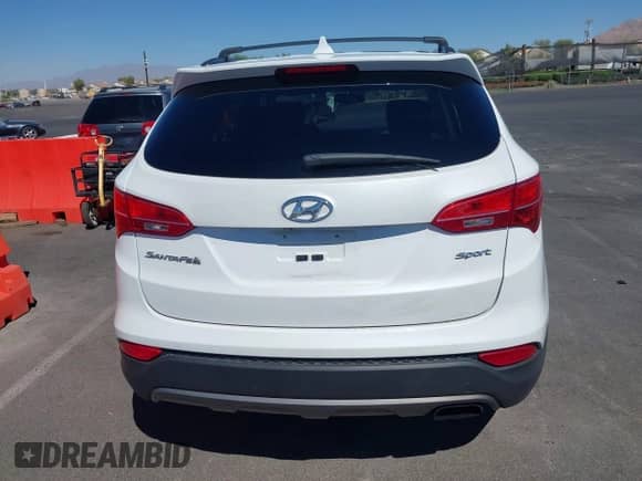 2016 Hyundai Santa Fe with VIN 5XYZU3LBXGG316388, listed as a IAAI auction lot 43215922 with 123,510 mi miles and . Bid and sale history available at DreamBid. Image 17.
