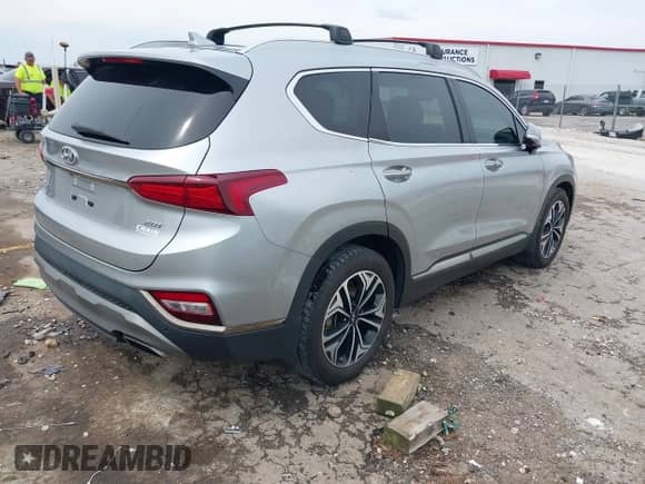 2020 Hyundai Santa Fe Limited с VIN 5NMS53AA5LH262149, выставлен на аукционе IAAI как лот 42463190 с пробегом 74 218 миль миль и . История ставок и продаж доступна на DreamBid. Изображение 4.
