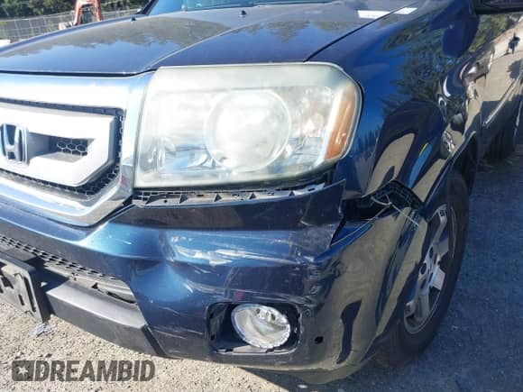 2009 Honda Pilot Touring with VIN 5FNYF489X9B007452, listed as a IAAI auction lot 43262557 with 206,355 mi miles and . Bid and sale history available at DreamBid. Image 6.