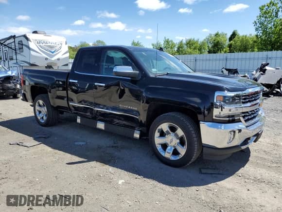 2017 Chevrolet Silverado 1500 LTZ with VIN 1GCVKSEC8HZ322729, listed as a Copart auction lot 57042225 with 67,390 mi miles and Salvage title. Bid and sale history available at DreamBid. Image 4.