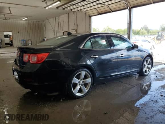 2014 Chevrolet Malibu LTZ с VIN 1G11J5SX4EF168729, выставлен на аукционе Copart как лот 72053715 с пробегом 184 605 миль миль и Списание • Salvage title. История ставок и продаж доступна на DreamBid. Изображение 3.