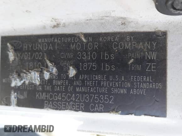 2002 Hyundai Accent GL z VIN KMHCG45C42U375352, wystawiony jako IAAI lot #42699297 z przebiegiem 103 540 mil mil oraz . Historia ofert i sprzedaży dostępna na DreamBid. Obrazek 9.