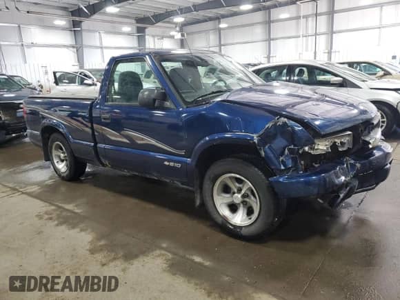 1999 Chevrolet S-10 LS with VIN 1GCCS1448XK137700, listed as a Copart auction lot 47007055 with 179,524 mi miles and Salvage title. Bid and sale history available at DreamBid. Image 4.