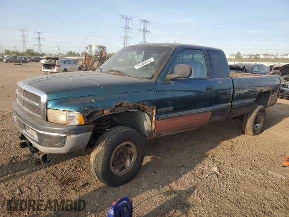 1999 Dodge 2500 with VIN 3B7KF23W5XG211333, listed as a Copart auction lot 71466855 with 209,282 mi miles and Salvage title. Bid and sale history available at DreamBid. Image 1.