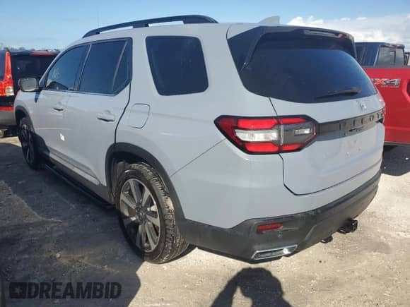 2023 Honda Pilot Touring with VIN 5FNYG2H72PB003263, listed as a Copart auction lot 75266044 with Not provided miles and Non repairable. Bid and sale history available at DreamBid. Image 2.