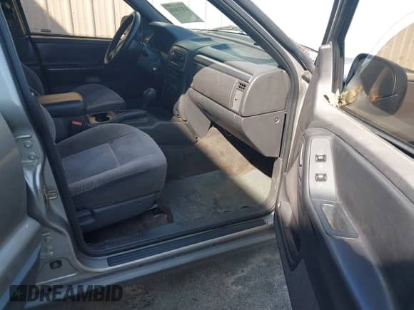 2001 Jeep Grand Cherokee Laredo с VIN 1J4GX48S01C735854, выставлен на аукционе IAAI как лот 43211634 с пробегом 137 648 миль миль и . История ставок и продаж доступна на DreamBid. Изображение 5.