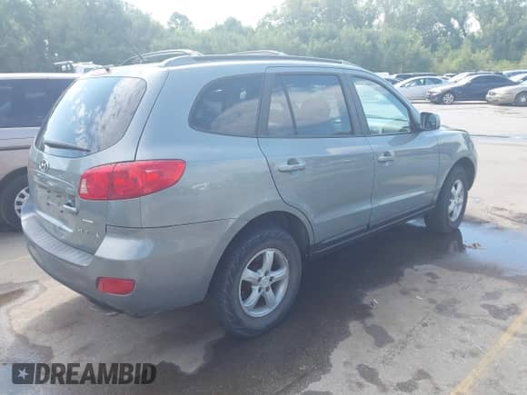 2007 Hyundai Santa Fe GLS with VIN 5NMSG13D37H037241, listed as a IAAI auction lot 43120895 with 180,556 mi miles and . Bid and sale history available at DreamBid. Image 4.
