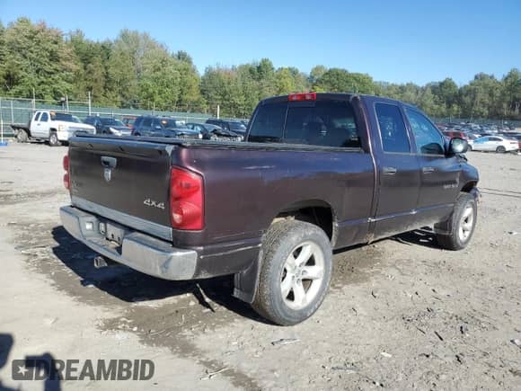 2007 Dodge 1500 ST z VIN 1D7HU18P17J579170, wystawiony jako Copart lot #74221284 z przebiegiem 139 429 mil mil oraz Szkoda całkowita • Salvage title. Historia ofert i sprzedaży dostępna na DreamBid. Obrazek 3.