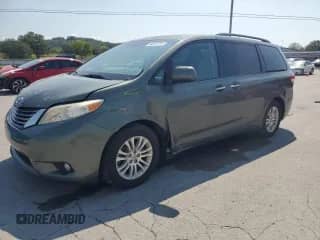 2012 Toyota Sienna XLE with VIN 5TDYK3DC8CS176623, listed as a Copart auction lot 80257225 with 262,472 mi miles and Salvage title. Bid and sale history available at DreamBid. Image 1.