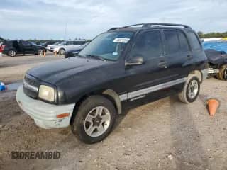 2002 Chevrolet Tracker с VIN 2CNBE13CX26900951, выставлен на аукционе Copart как лот 83871514 с пробегом 122 718 миль миль и Списание • Salvage title. История ставок и продаж доступна на DreamBid. Изображение 1.