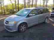 2013 Dodge Grand Caravan SXT with VIN 2C4RDGCG6DR552885, listed as a IAAI auction lot 43474896 with 187,451 mi miles and . Bid and sale history available at DreamBid. Image 2.