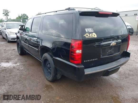 2009 Chevrolet Suburban LTZ z VIN 1GNFK36399R290858, wystawiony jako IAAI lot #42738830 z przebiegiem 214 790 mil mil oraz . Historia ofert i sprzedaży dostępna na DreamBid. Obrazek 3.