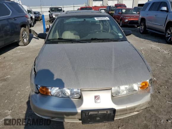 2000 Saturn SL with VIN 1G8ZK5275YZ125604, listed as a Copart auction lot 48334375 with 183,916 mi miles and Salvage title. Bid and sale history available at DreamBid. Image 5.